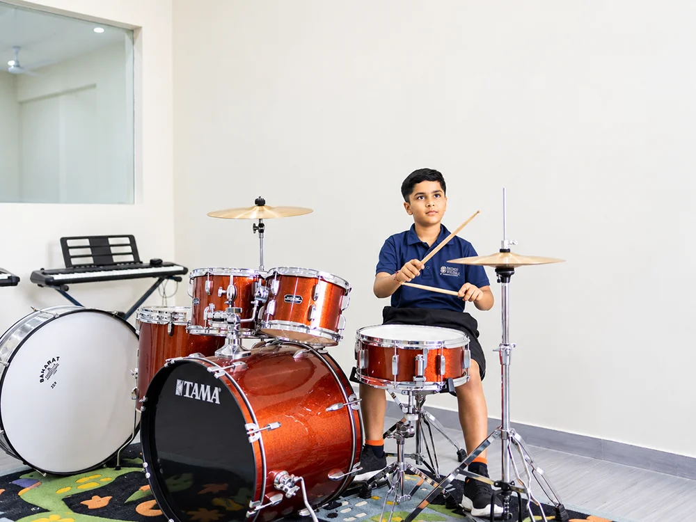 Young Drummer in a Music Studio