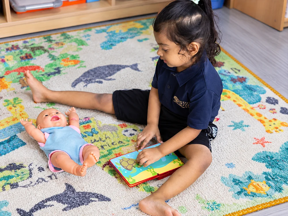 Preschool storytime on an ocean rug