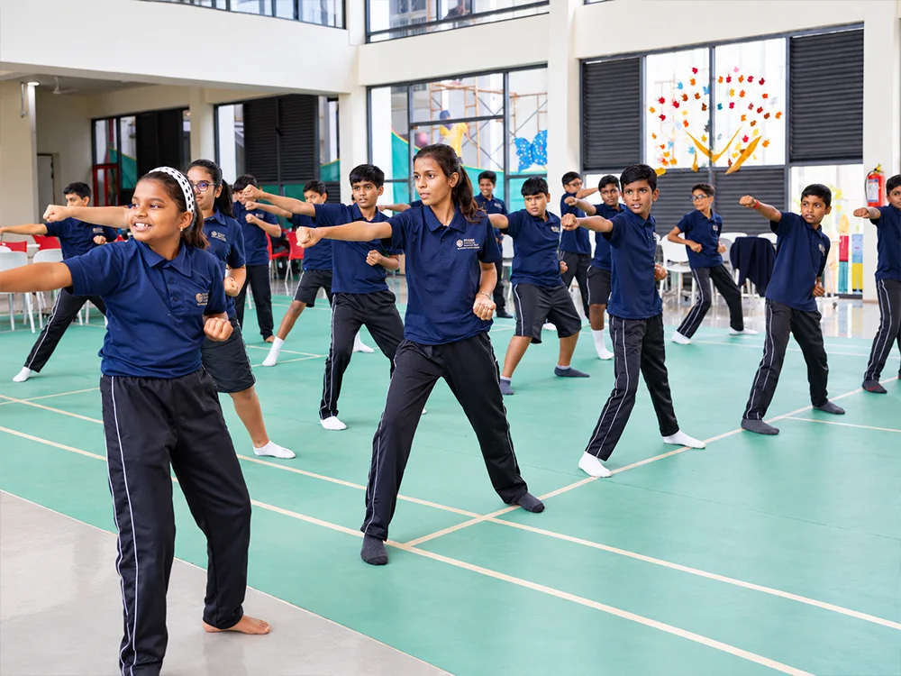 Schoolchildren practising martial arts together